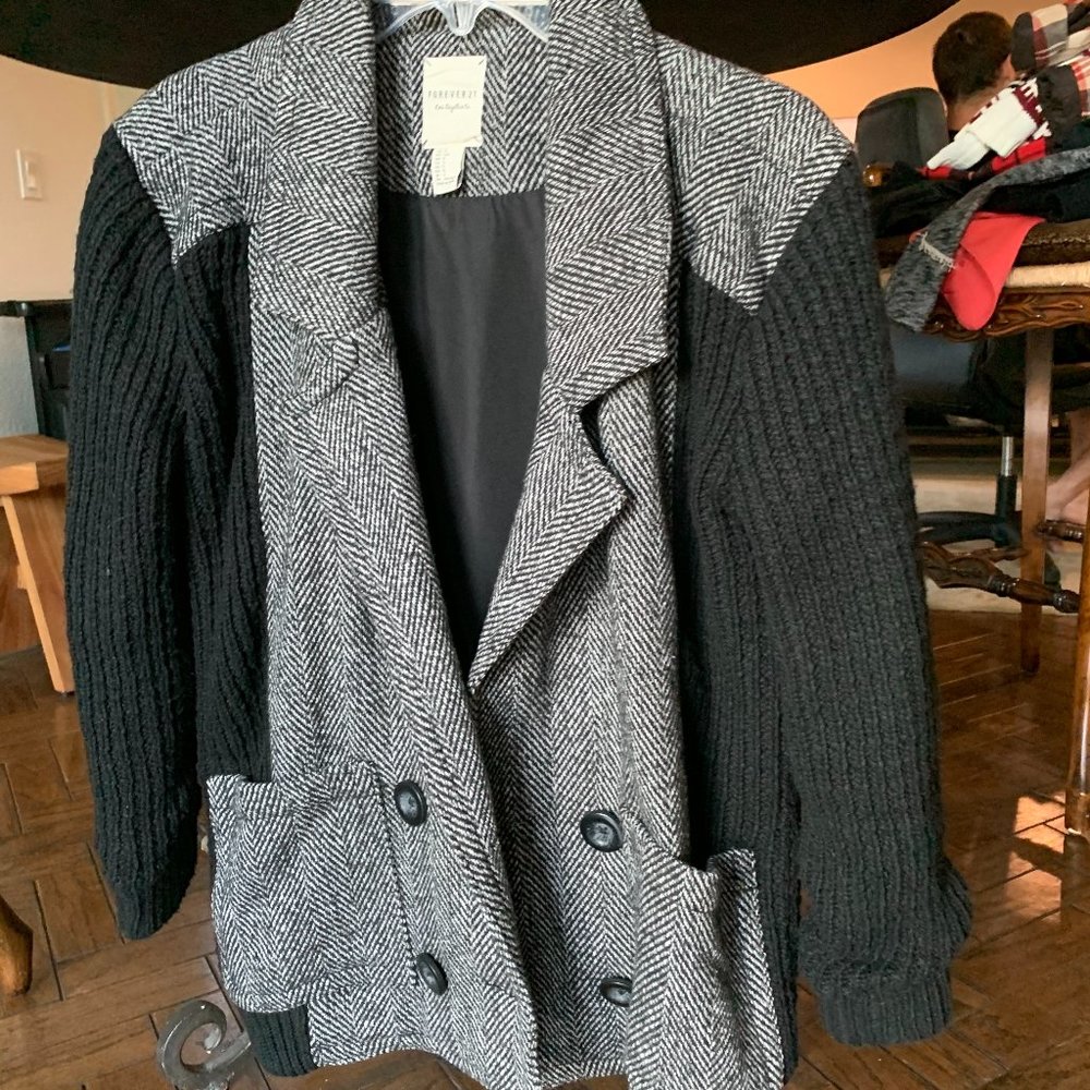 Gray pea coat jacket with black fabric sleeves